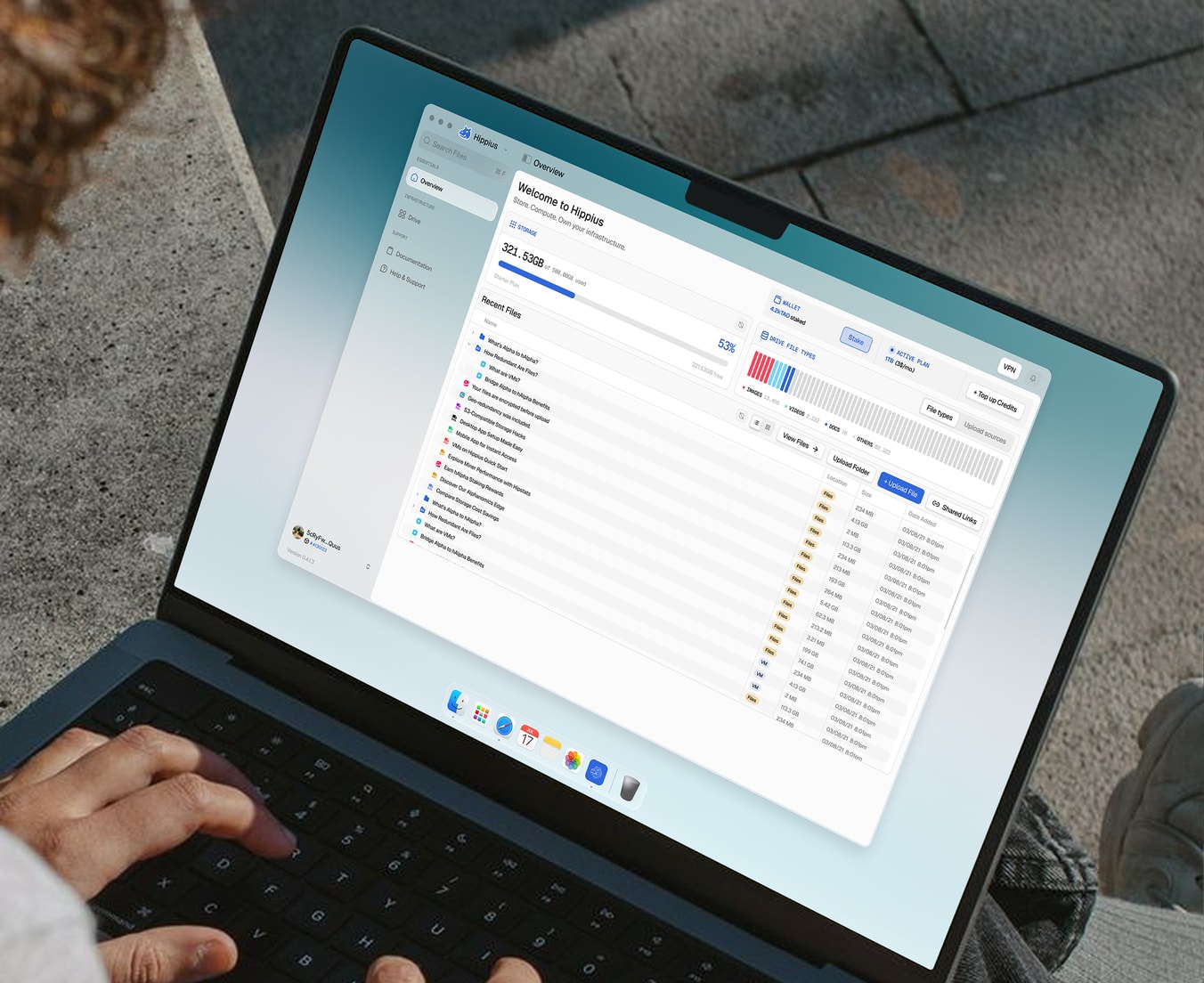 The Hippius desktop app open on a laptop
